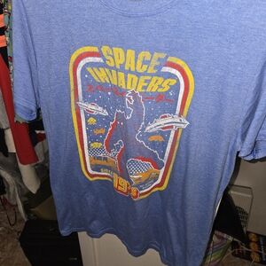 Space Invaders 1978 Vibrant Blue Short Sleeve Tee with Graphic Design